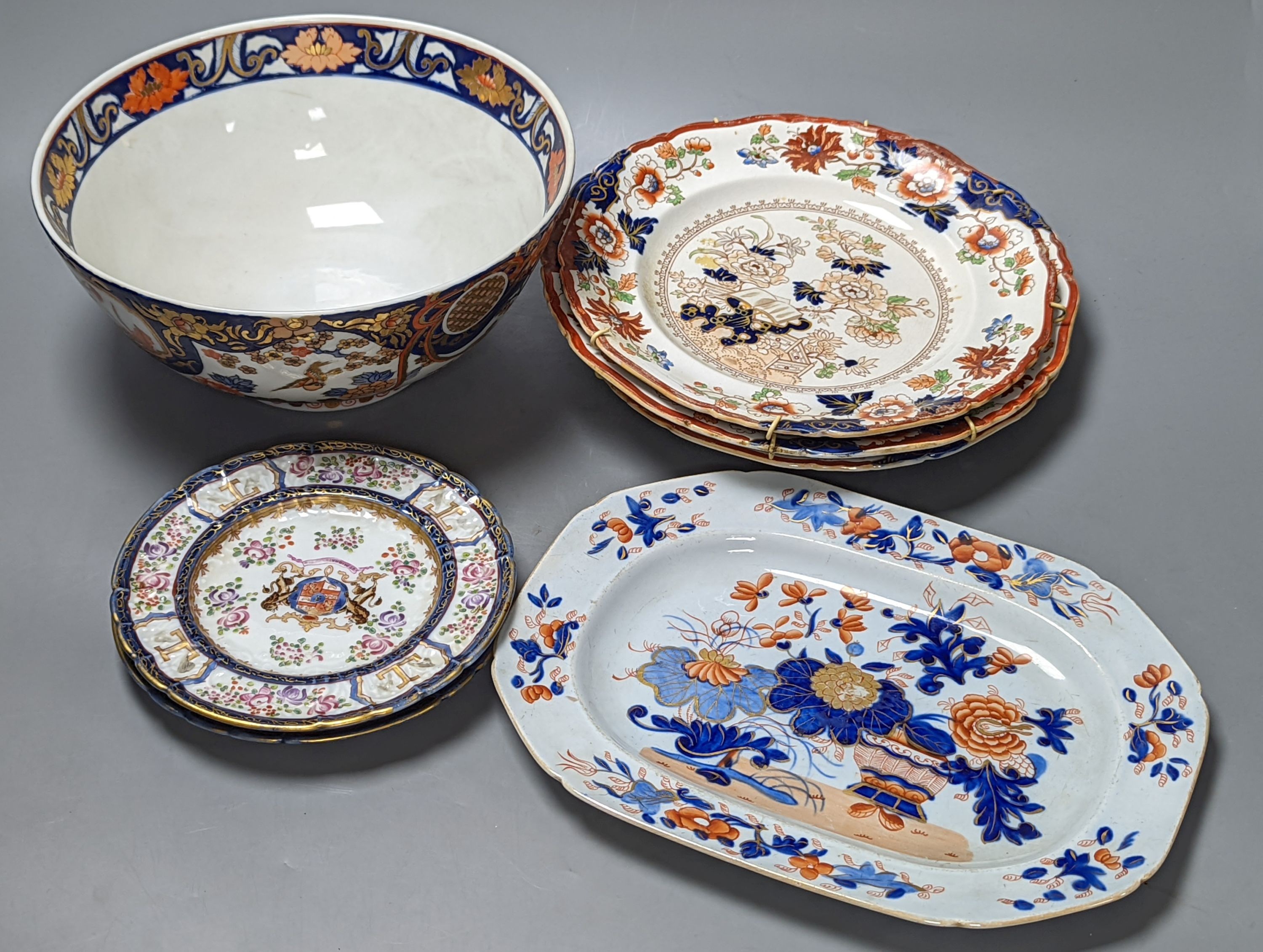 Three Masons plates, a similar platter, two armorial plates and a Japanese bowl, stoneware platter 29 cms wide.